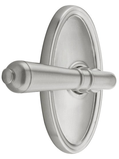 Oval Rosette Set With Turino Levers Left Hand in Satin Nickel.